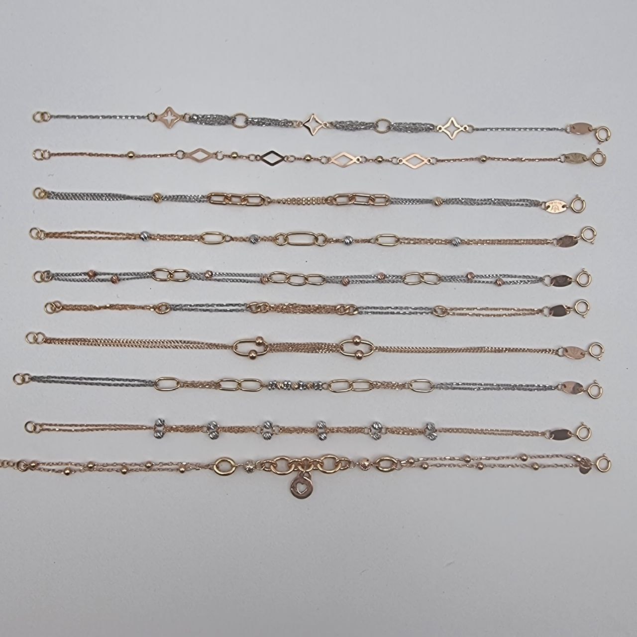 دستبند طلا ده طرح جذاب AJ4827